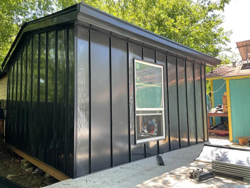 Black standing seam metal wall panels for Roof Inspection in Mandeville