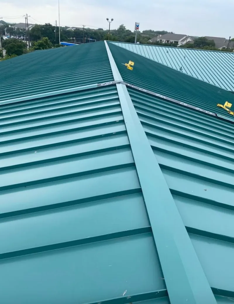 Green commercial metal roof ridge and valley for Metal Roof Repair in Mandeville